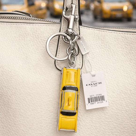 Coach Accessories - Coach Yellow Taxi Cab Keyring Bag Charm Accessory NEW with tags